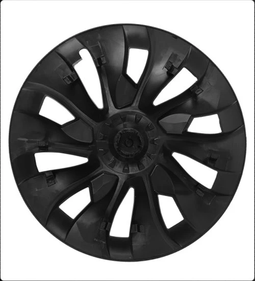 Tesla hubcap with snap design on the back Tesla hubcap with snap design on the back
