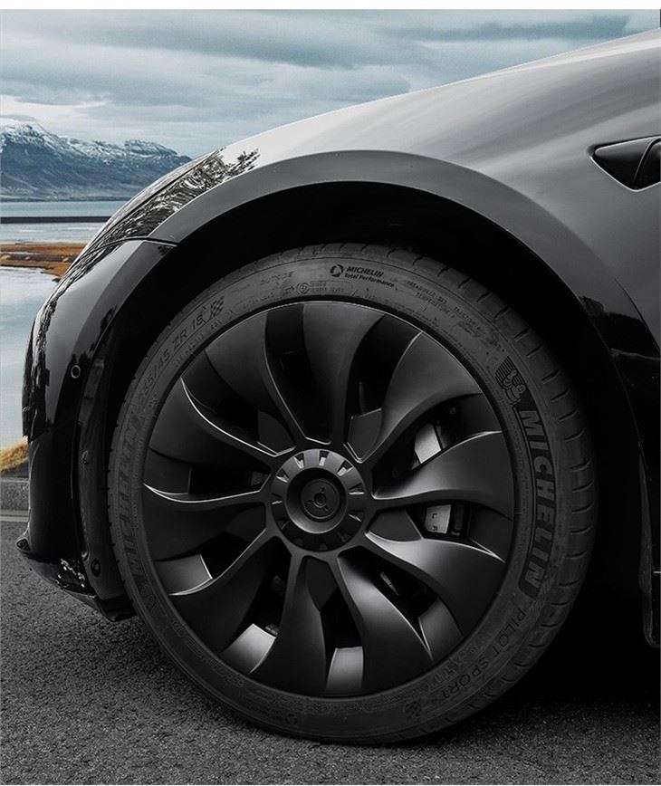 Tesla y 3 hubcap real shot 1