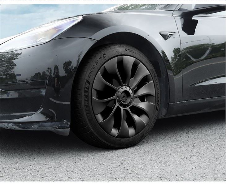 Tesla y 3 hubcap real shot 2